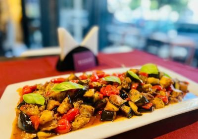 Mushroomed aubergines with cherry tomatoes, a local delicacy.